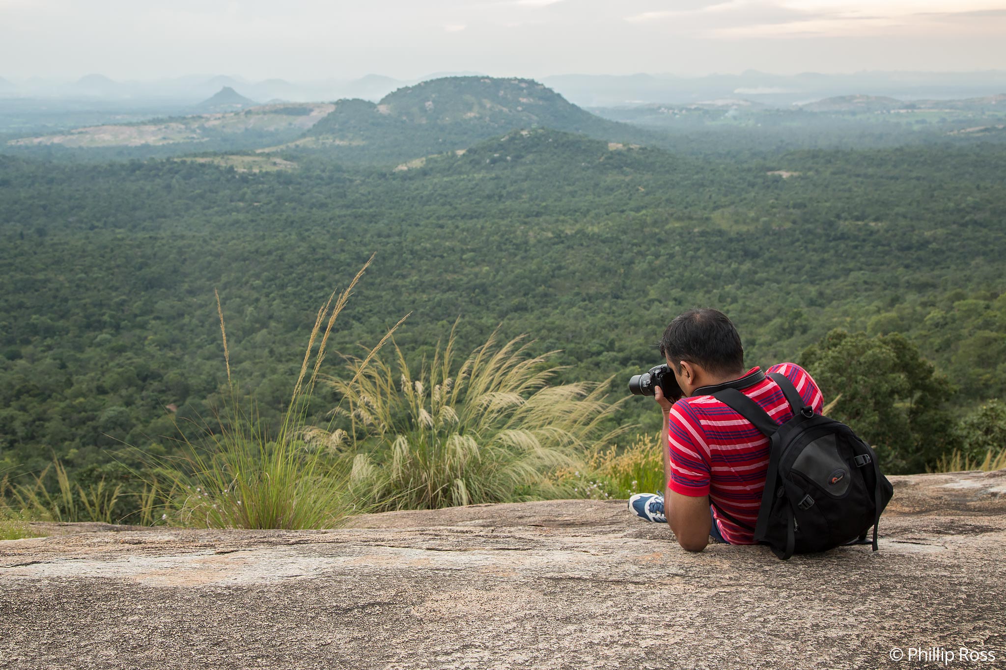 A participant on our Photography Workshop photographing the beautiful landscape of Bannerghatta